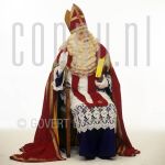 Sinterklaas, Bram van der Vlugt at studio in Amsterdam.

[keywords]Posed, Full Length, Book, Chair[/keywords]